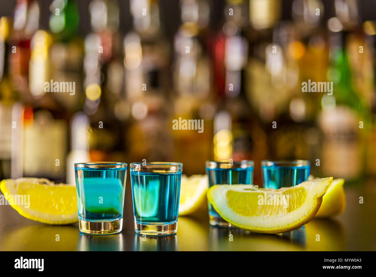 Popular blue drink shot kamikaze on the background of the bar with ...