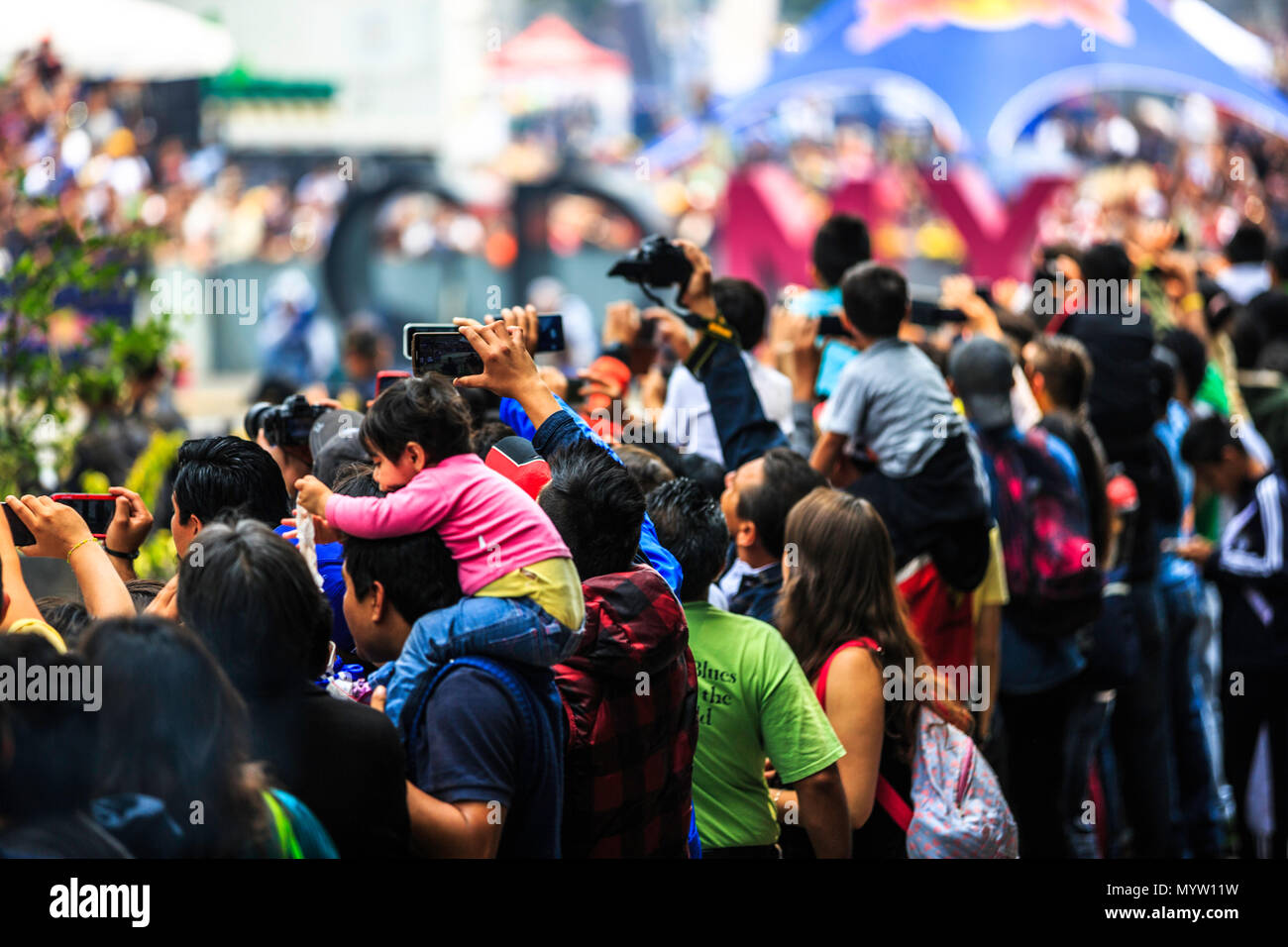 Mexico City, Mexico - June 27, 2015: Audience taking pictures and video of the event, at the Infiniti Red Bull Racing F1 Showrun. Stock Photo