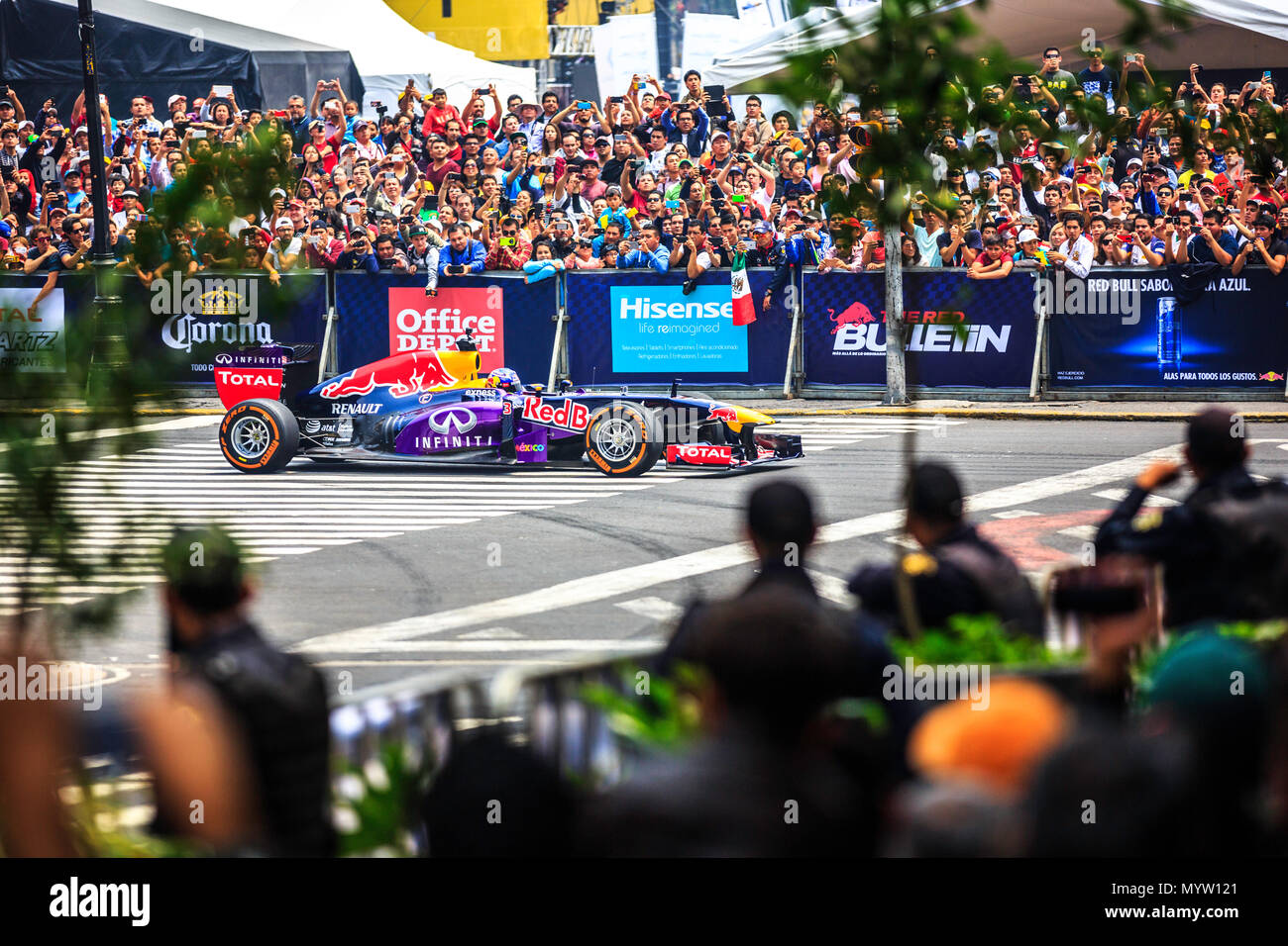 Mexico City, Mexico - June 27, 2015: Daniel Ricciardo driving around the Mexico City Zocalo Square at the Infiniti Red Bull Racing F1 Showrun. Stock Photo