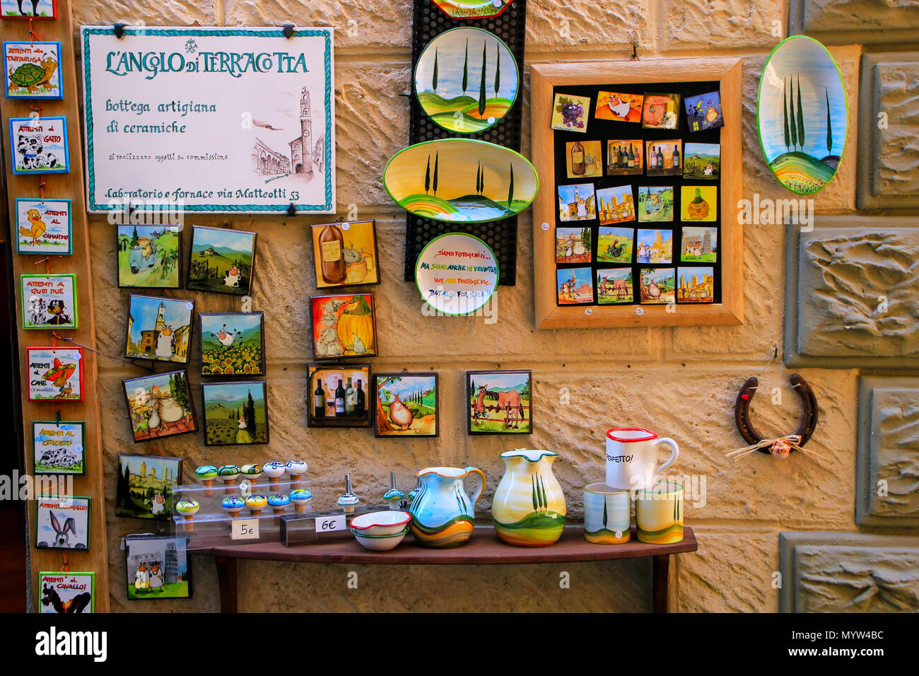 Display of ceramic souvenirs at a shop in Montalcino town, Val d'Orcia, Tuscany, Italy. The town takes its name from a variety of oak tree that once c Stock Photo