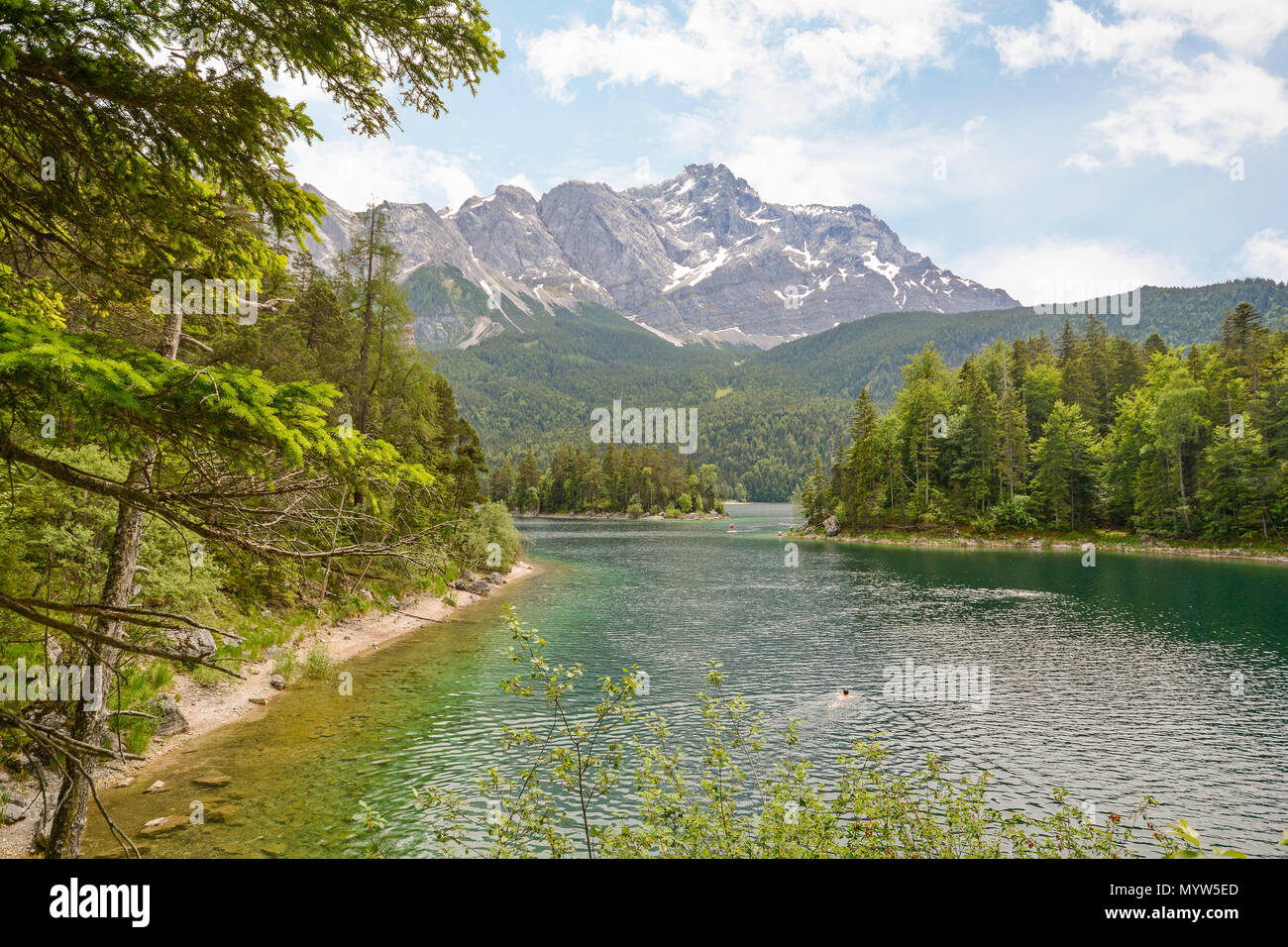 View to lake Eibsee and Zugspitze, Germany`s highest mountain in the ...