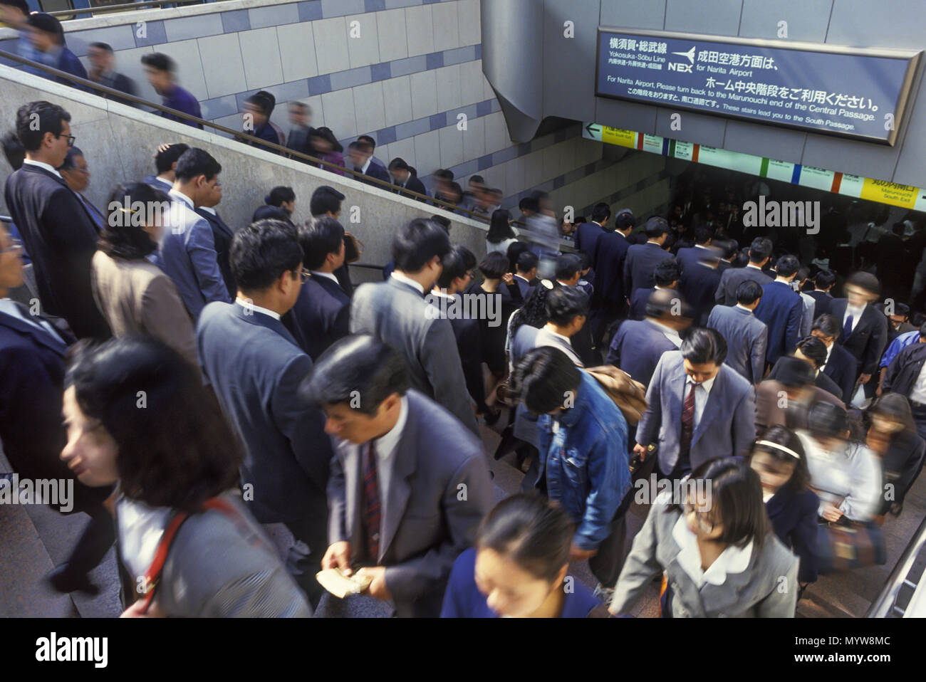 1992 HISTORICAL COMMUTERS ESCALATORS UENO METRO STATION TOKYO JAPAN Stock Photo
