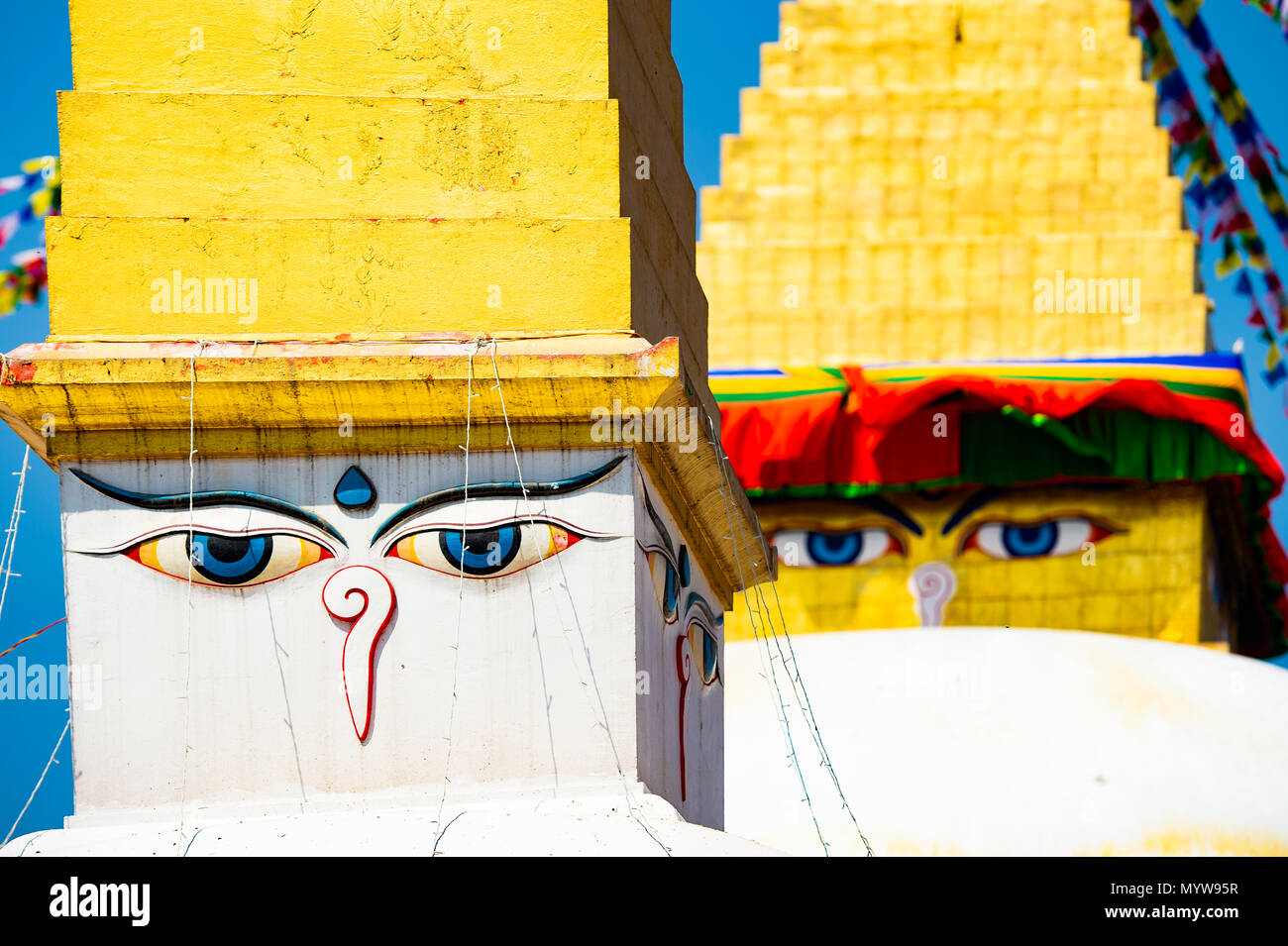 (Selective focus) Wisdom eye on a Swayambhunath Stupa also known as Monkey Temple. Swayambhunath Stupa is an ancient religious architecture atop a hil Stock Photo