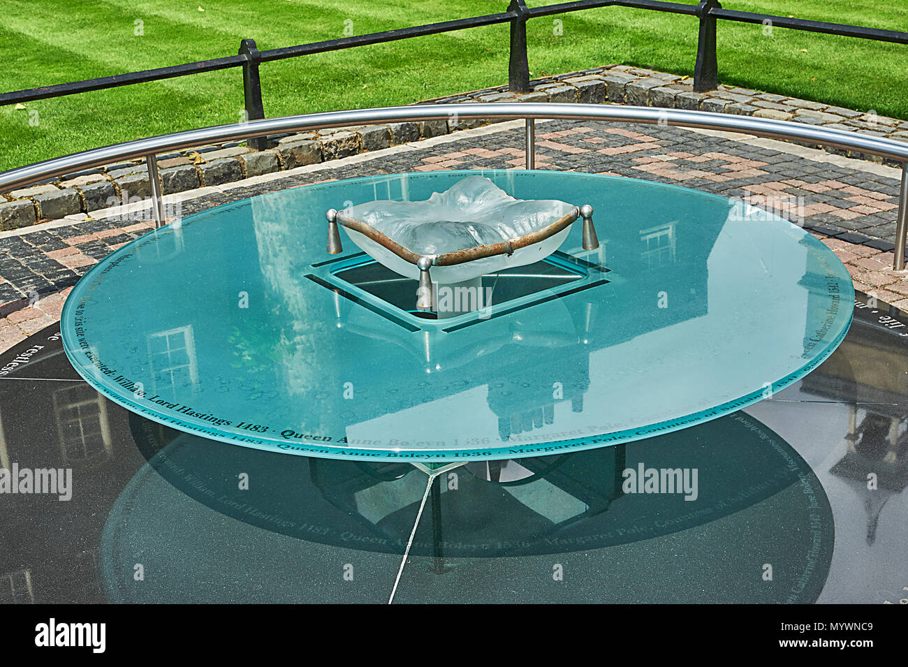 Glass monument table at the Tower of London with a glass pillow, onto which  is inscribed the names of key people executed on this spot Stock Photo -  Alamy