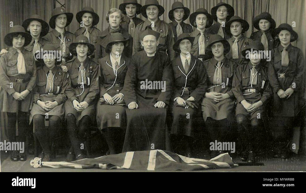 . English: 17th Swindon Guides at St Barnabas Church, Gorse Hill, Swindon. The photographer was Fred C. Palmer of Tower Studio, Herne Bay, Kent ca. 1905-16, and of 6 Cromwell Street, Swindon ca. 1920-36. He died 1941.  . 1935. Fred C. Palmer (died 1941) 3 17th Swindon Guildes 1935 Stock Photo