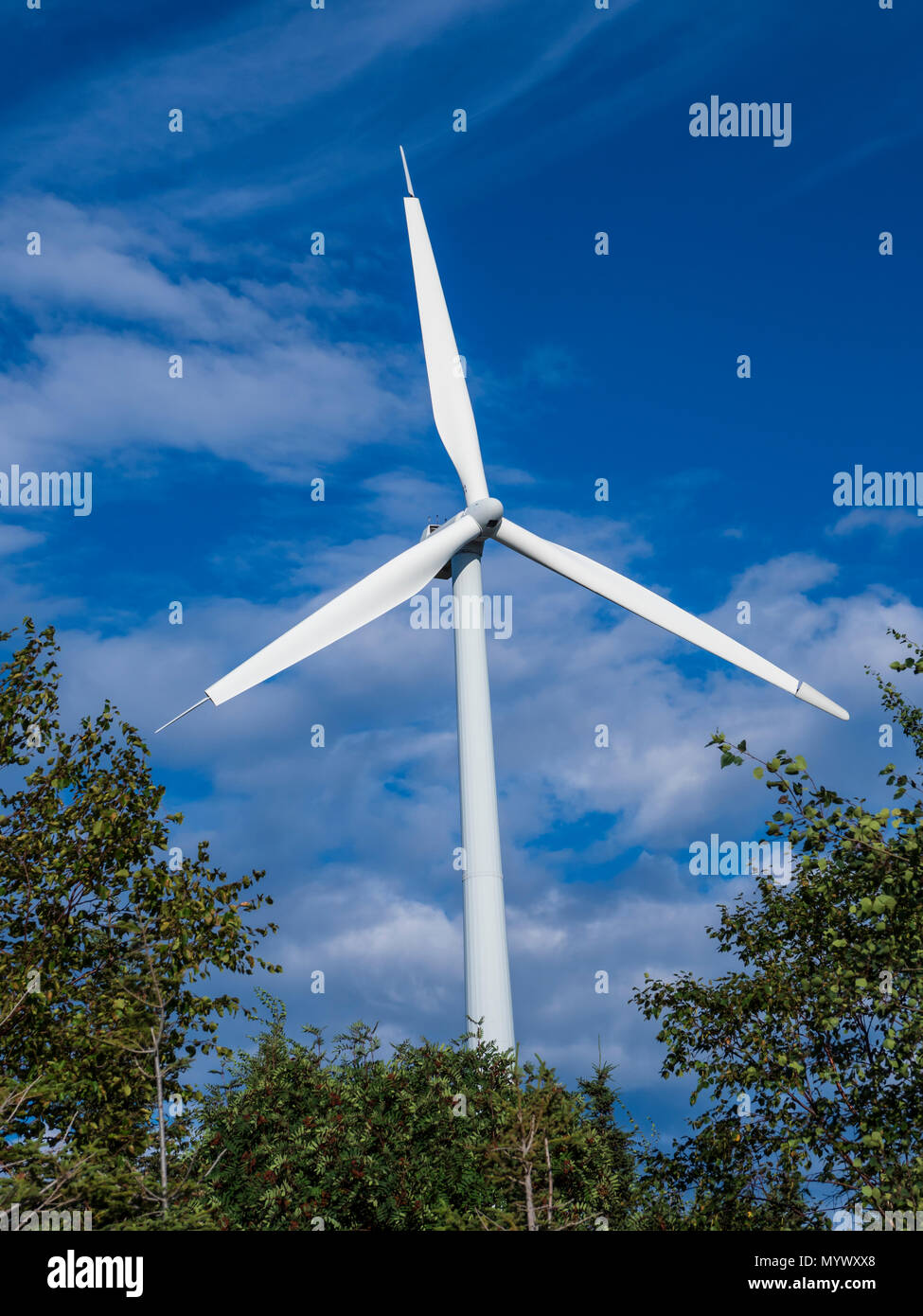 Wind turbine with aerodynamic tip brakes extended.  Le Nordais Windmill Park wind generation station, village of Cap-Chat, Gaspe Peninsula, Quebec, Ca Stock Photo