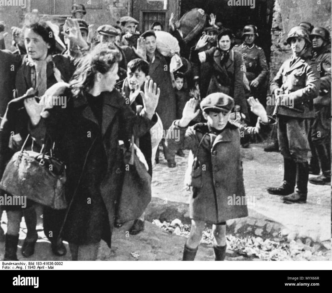 .  Information added by Wikimedia users.  Note: This is a low-quality, cropped version of a famous photo acquired from an East German/GDR archive (ADN). For the complete photograph (with the little girl Hanka Lamet on the left) see the other versions. English: Warsaw Ghetto Uprising - Photo from Jürgen Stroop Report to Heinrich Himmler from May 1943. The original German caption reads: 'Forcibly pulled out of dug-outs'. People recognized in the picture: Boy in the front was not recognized, some possible identities: Artur Dab Siemiatek, Levi Zelinwarger (next to his mother Chana Zelinwarger) and Stock Photo