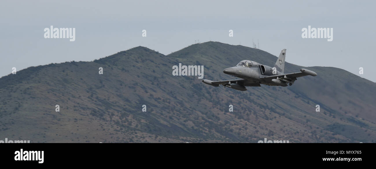 A Draken International L-159E Honey Badger aircraft heads for the Oregon Test and Training Range to simulate an adversary during training missions for the 173rd Fighter Wing under a contract to test their services for future use, June 5, 2018. The U.S. Air Force is evaluating if a permanent contract will successfully increase student pilot training for the air superiority mission in the F-15 Eagle. (U.S. Air National Guard photo by Tech. Sgt. Jefferson Thompson) Stock Photo