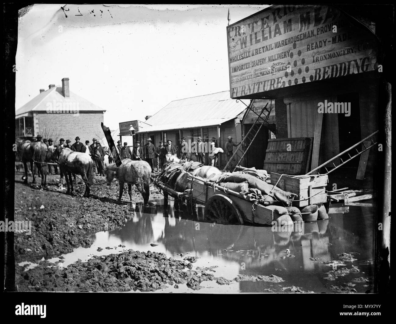 . English: Cart bogged in what was originally a gold digging outside William Meares flooded Criterion Store, Hill End, New South Wales, Australia, taken in 1872  . 11 March 2014, 14:19:21. American & Australasian Photographic Company 1 Cart bogged in what was originally a gold digging outside William Meares flooded Criterion Store, Hill End A2822717h Stock Photo