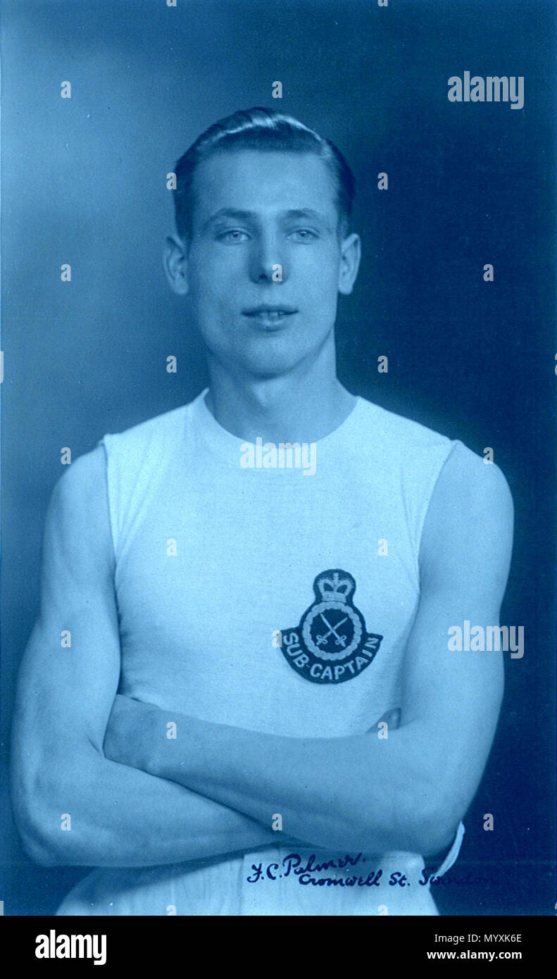 . Image edited with blue tint by uploader, to show possible parallel with Picasso blue period. Original image description  Portrait photo of a young sportsman at Swindon, Wiltshire, England in the 1920s or 30s. The badge represents the Army Physical Training Corps. The sub-captain rank possibly indicates that he is a footballer. From a postcard deposited at Swindon Record Office and scanned and uploaded by them to Flickr. The photographer was Fred C. Palmer of Tower Studio, Herne Bay, Kent ca.1905-1920, and of 6 Cromwell Street, Swindon ca.1920-1936. He is believed to have died 1936-1939. Poin Stock Photo