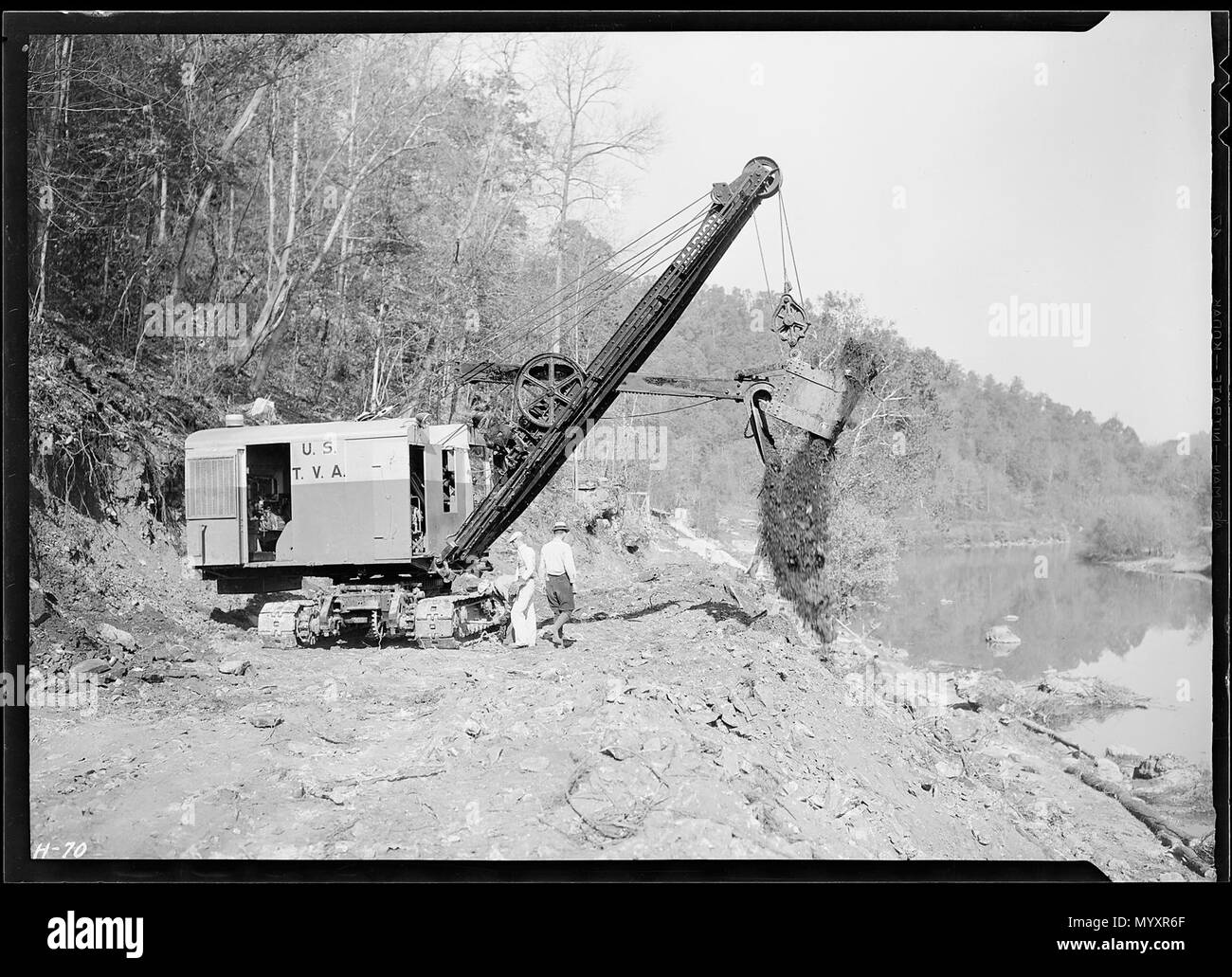 Making the dirt fly at Norris Dam site. A power shovel working on the