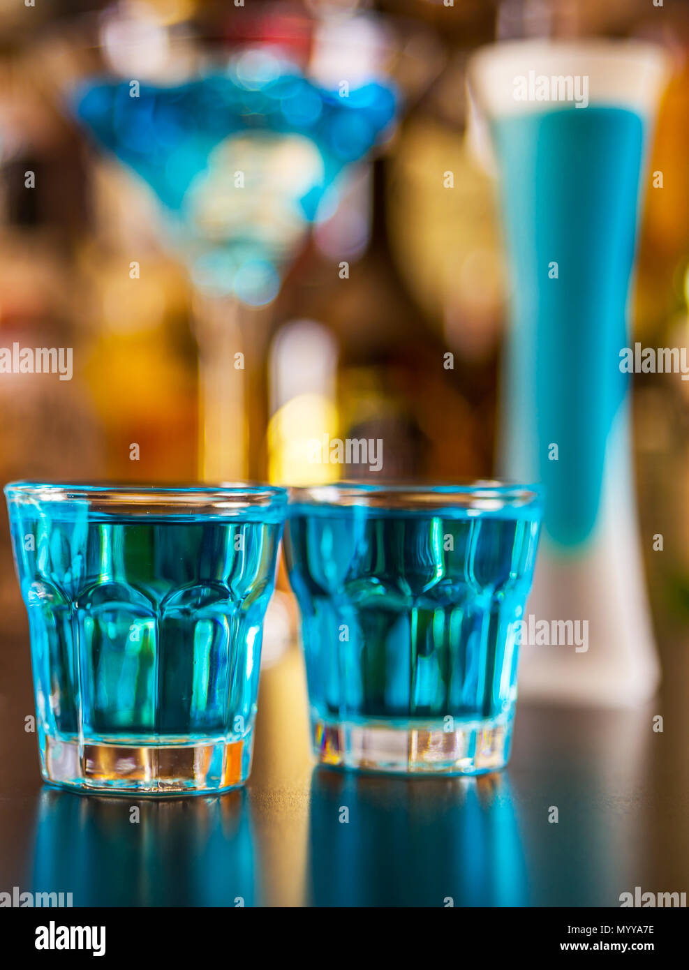 Popular blue drink shot kamikaze on the background of the bar with ...