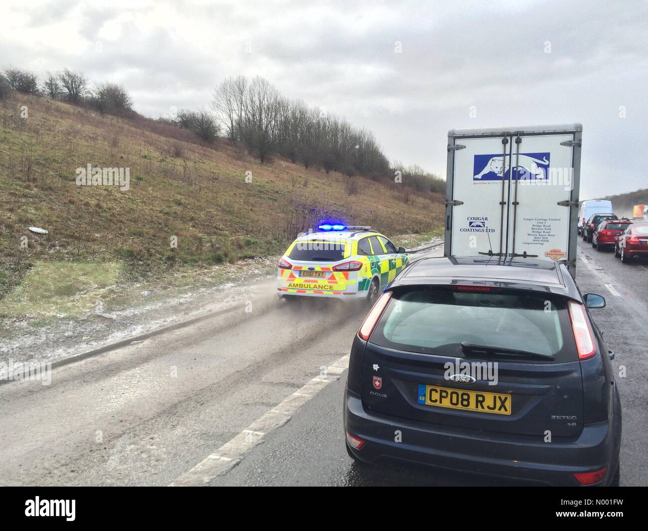 Banwell, North Somerset, UK. 23rd Feb, 2015. Paramedic car rushes to scene of an accident on the M5 southbound motorway © tcrphotography / StockimoNews/Alamy Live News Credit:  tcrphotography/StockimoNews/Alamy Live News Stock Photo