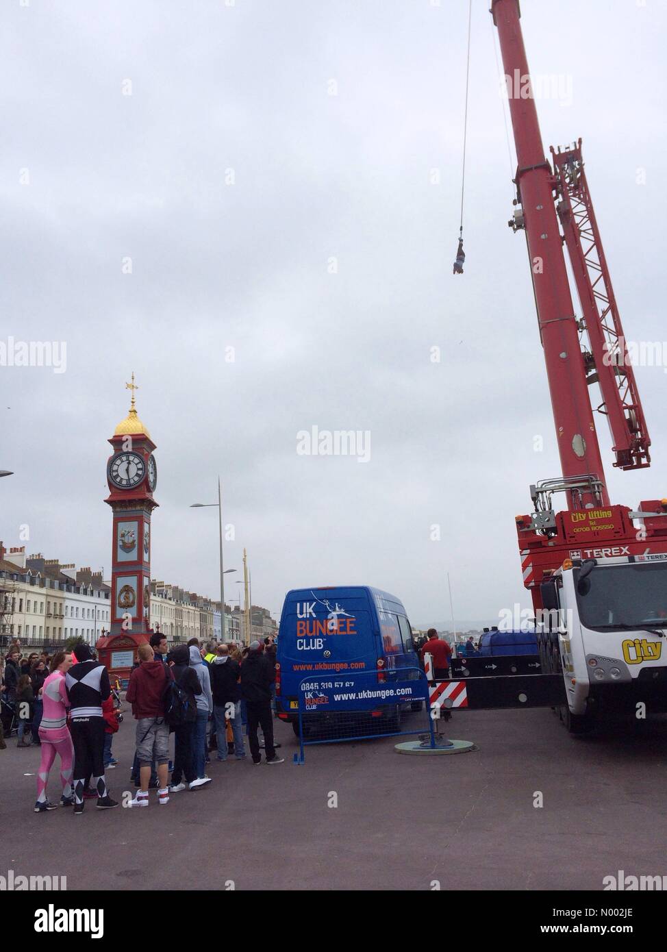 Weymouth, Dorset, UK. 02nd May, 2015. As part of the Weymouth Kite Festival for the first time jumpers, including members of the Dorset Blind Society, take part in a charity UK bungee from The Clock Tower at Weymouth. Credit:  Carolyn Jenkins/StockimoNews/Alamy Live News Stock Photo