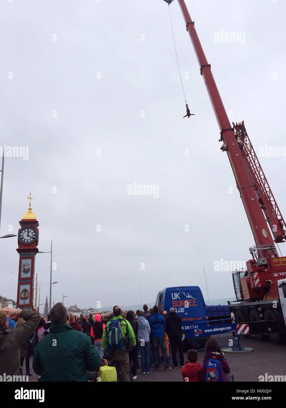Weymouth, Dorset, UK. 02nd May, 2015. As part of the Weymouth Kite Festival for the first time jumpers, including members of the Dorset Blind Society, take part in a charity UK bungee from The Clock Tower at Weymouth. Credit:  Carolyn Jenkins/StockimoNews/Alamy Live News Stock Photo