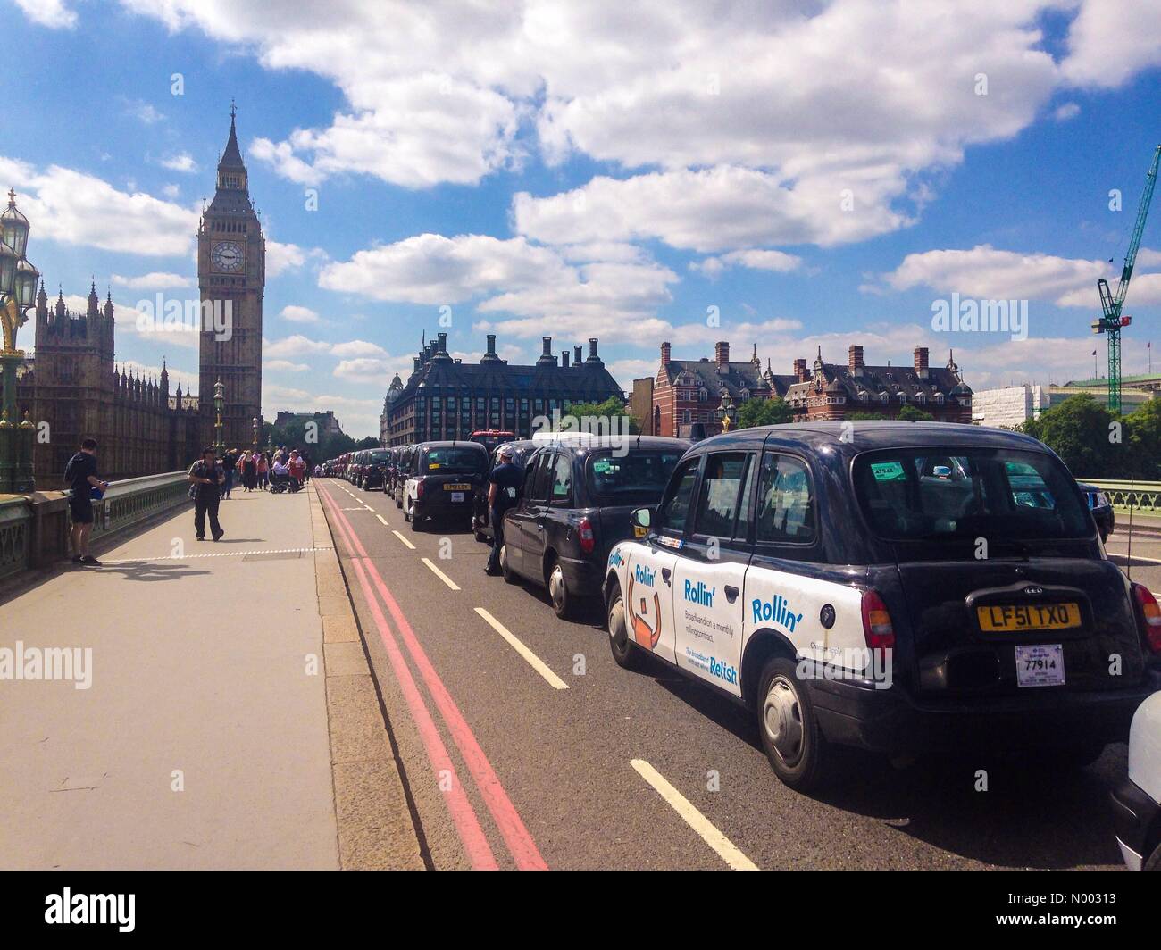 London, UK. 26th May, 2015. London black cab drivers protest against the taxi app uber on Westminster Bridge. Credit:  Paul Swinney/StockimoNews/Alamy Live News Stock Photo