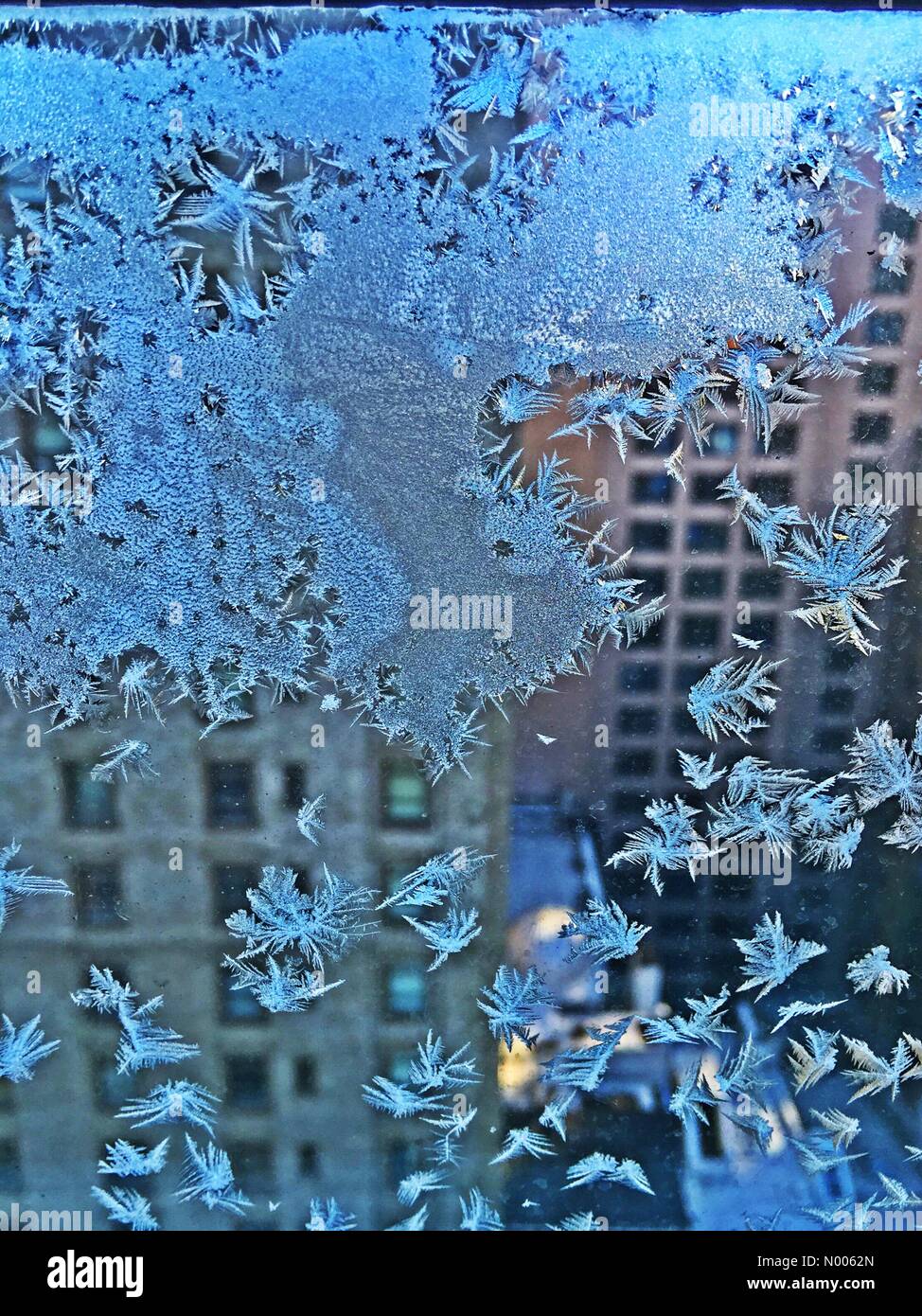 Icy windowpane in frigid New York City Stock Photo