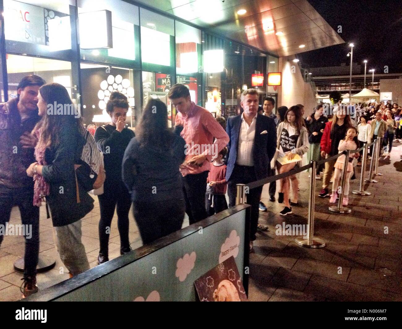 Victoria Ave, Chatswood NSW, Australia. 12th Apr, 2016. Crowds in Chatswood, Sydney lineup for the Ben and Jerry's Free Cone Day promotional event. Credit:  mjmediabox/StockimoNews/Alamy Live News Stock Photo