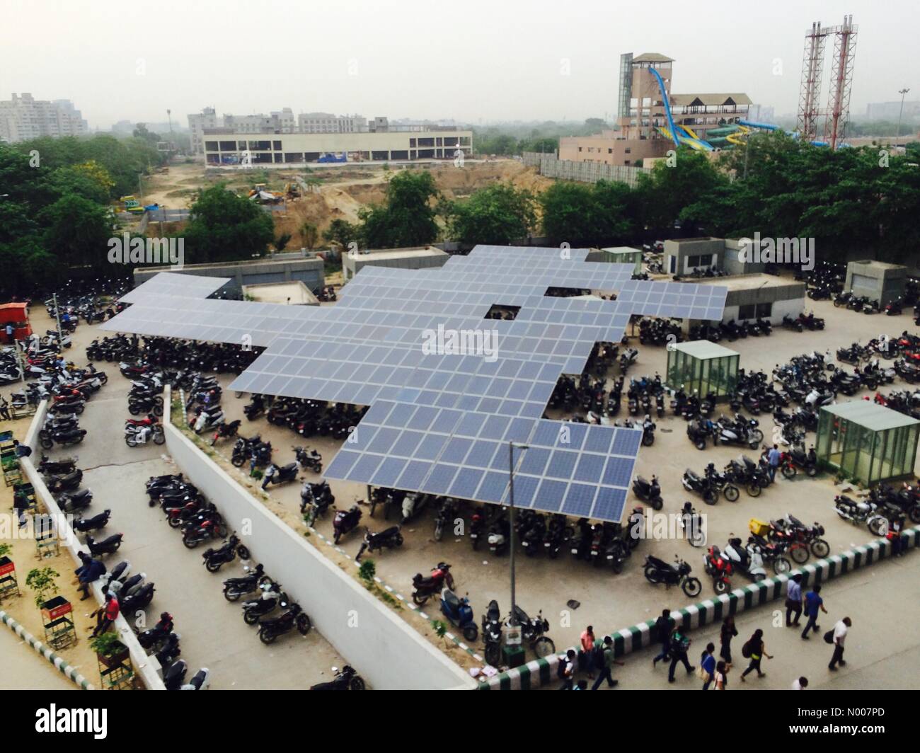 Solar panel over the parking of HUDA city centre metro station installed by Indian Government to produce electricity. Stock Photo