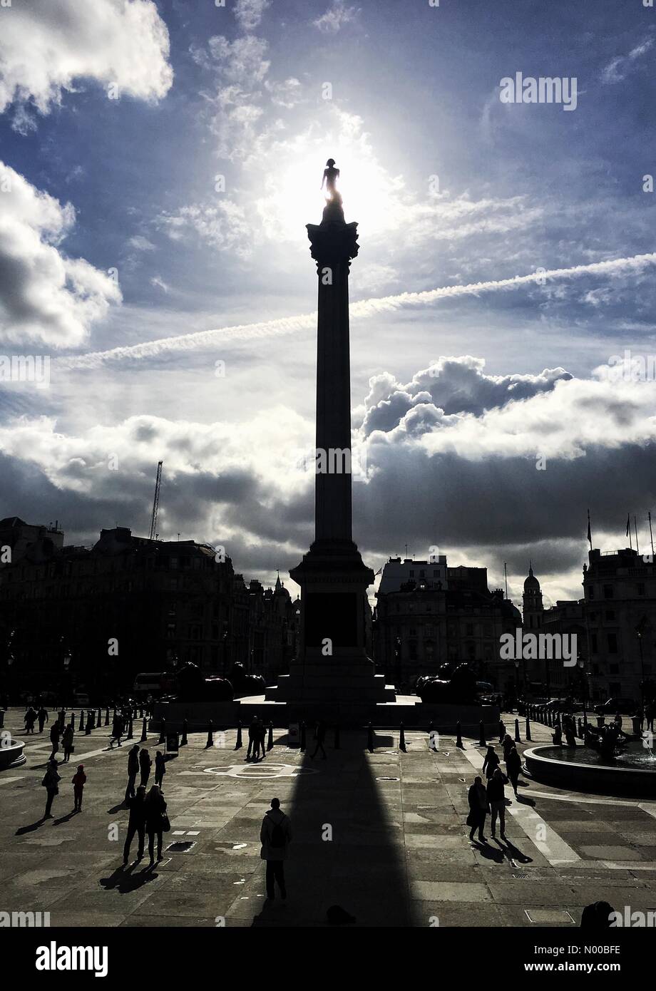 London, UK. 06th Mar, 2017. UK Weather: A crisp, spring morning as the sun shines from behind Nelson's Column in Trafalgar Square, London, England, UK. Credit: Jamie Gladden/StockimoNews/Alamy Live News Stock Photo