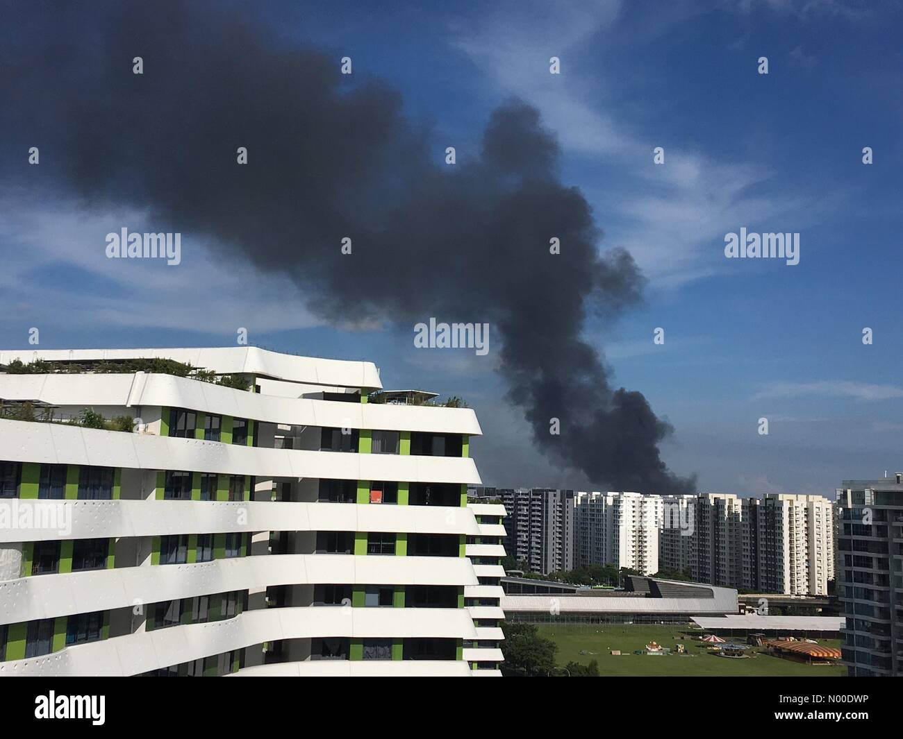 Punggol, Singapore. 16th May, 2017. Thick smoke at Punggol, northeast of Singapore. Credit: Caroline Pang / StockimoNews/Alamy Live News Stock Photo