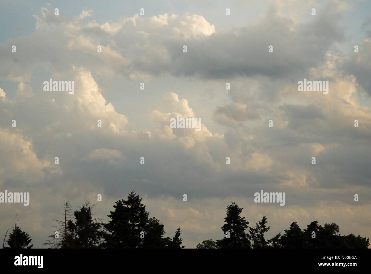 UK Weather Stormy sunrise over Godalming. Tuesley Farm, Godalming