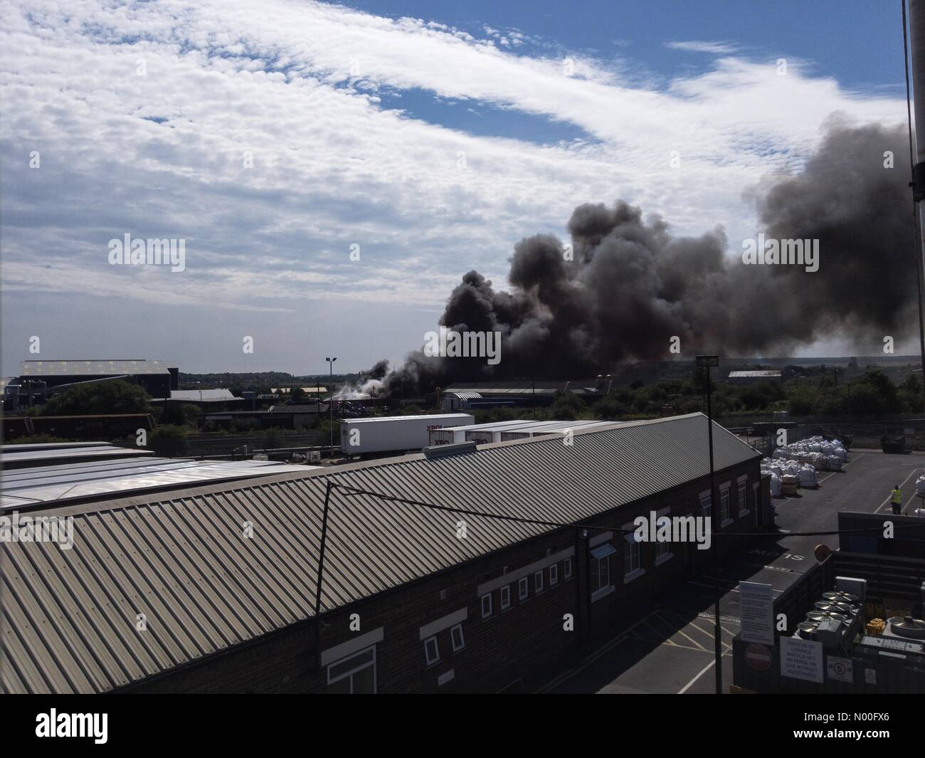 Worksop, UK. 18th July, 2017, Smoke billowing from fire at plastics