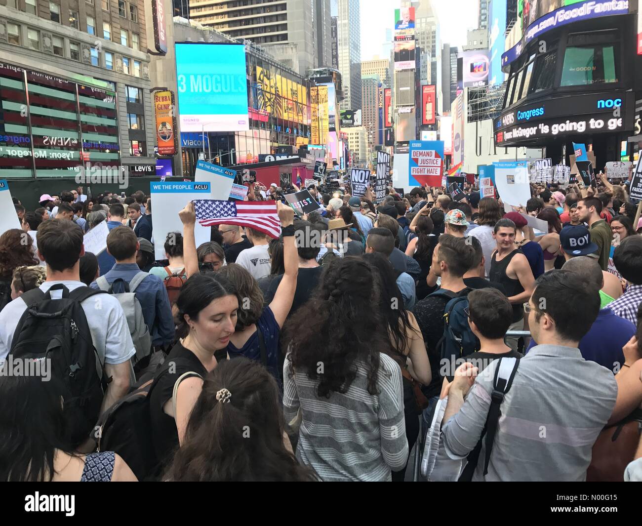 W 43rd St, New York, New York, USA. 26th July, 2017. Today 07/26/12017, Protesters in Times Square, NYC to denounce Trump’s transgender military ban Credit: Ryan Rahman/StockimoNews/Alamy Live News Stock Photo
