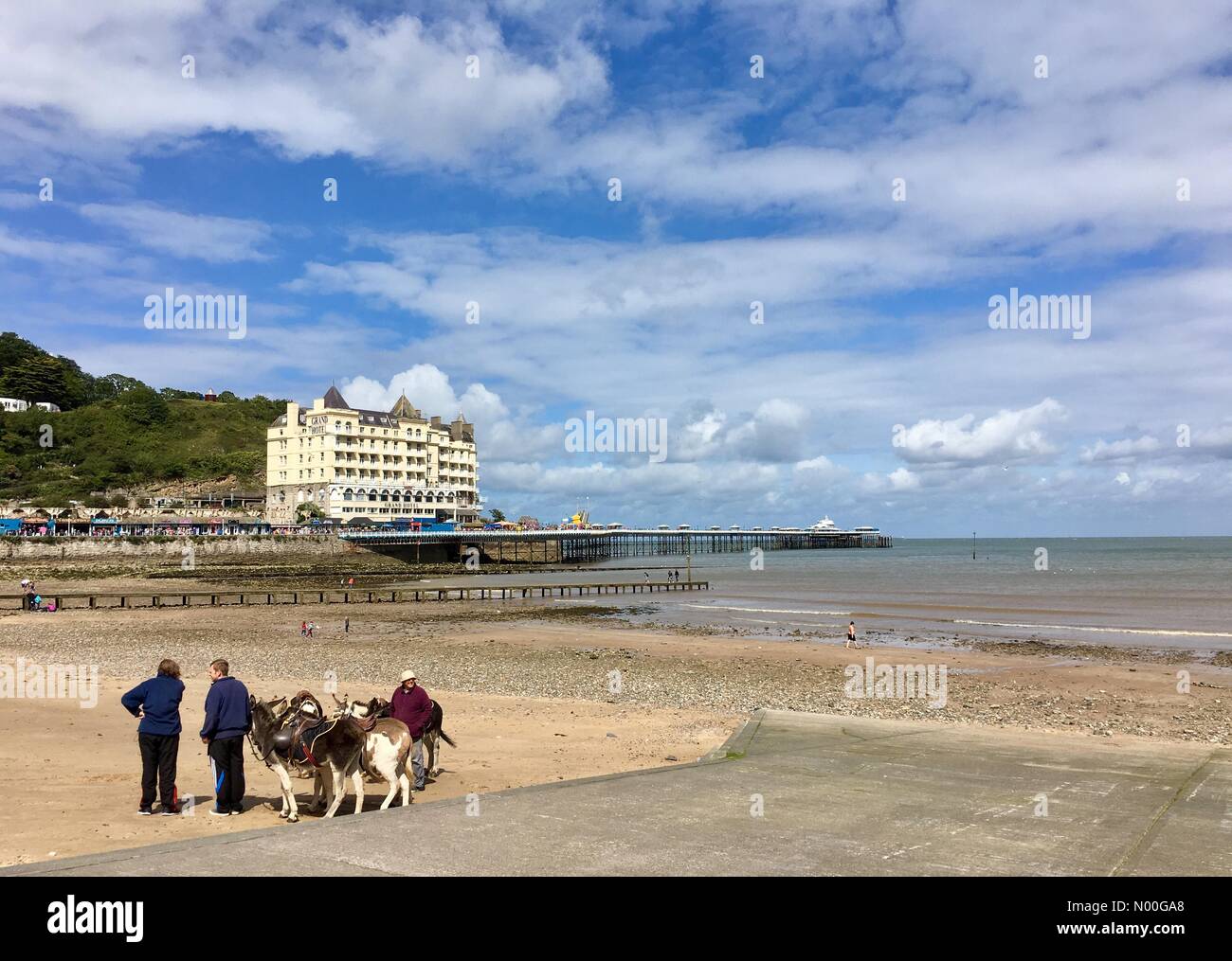 UK Weather Sunny spells in Llandudno, North Wales. Sunny but windy on