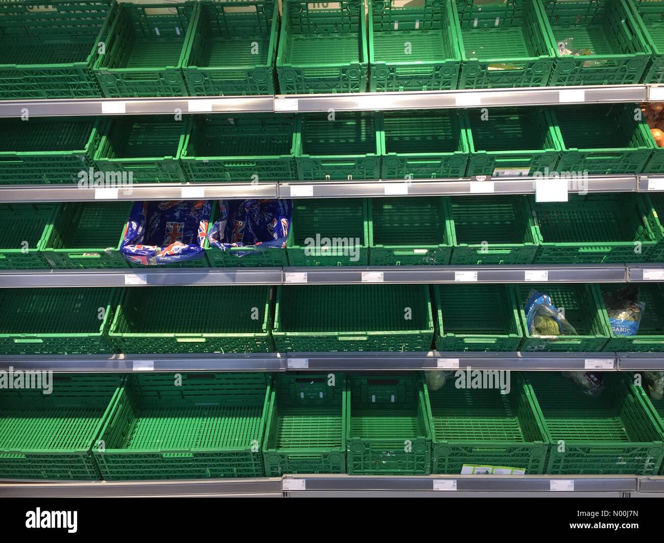 Builth Wells, Powys, Wales. 10th December 2017. Shelves are empty at the Coop supermarket due to delivery vehicle unable to visit because of snow. Credit: Graham M. Lawrence/StockimoNews/Alamy Live News Stock Photo