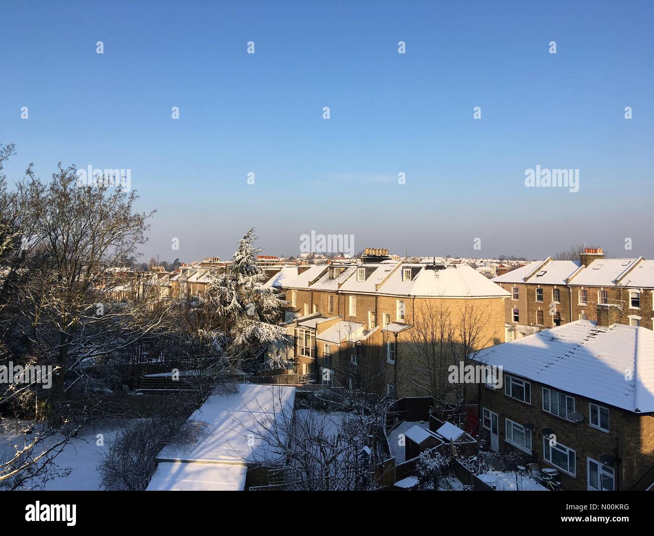 London, UK. 28th Feb, 2018. UK Weather Snow covers rooftops in