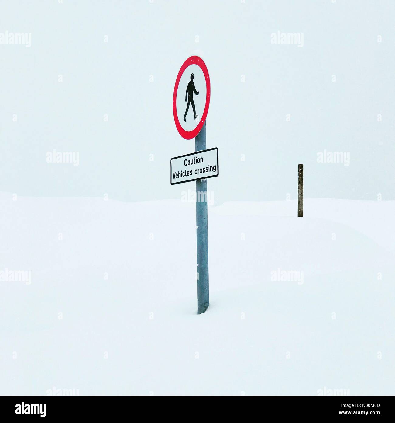 Brampton, UK. 01st Mar, 2018. Caution vehicles crossing sign in the snow Credit: David Crausby/StockimoNews/Alamy Live News Stock Photo