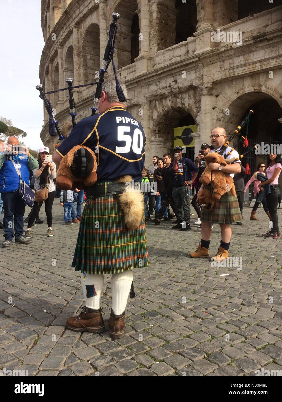 Rome, Italy. Bagpipes played in Rome by Scotland supporters outside Colosseum Credit: PennPix/Matt Pennington/StockimoNews/Alamy Live News Stock Photo