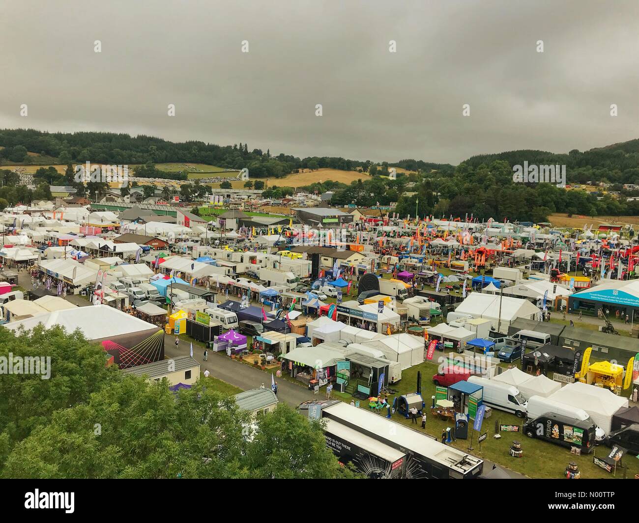 Builth Wells, Powys, Wales. 23rd July 2018. Aerial view of the show ground on first day of the Royal Welsh Show in Builth Wells, Powys, Wales. Picture taken 9.15am, Monday 23 July 2018. Record attendance expected over the four days of the show. Credit: Ceri Breeze/StockimoNews/Alamy Live News Stock Photo