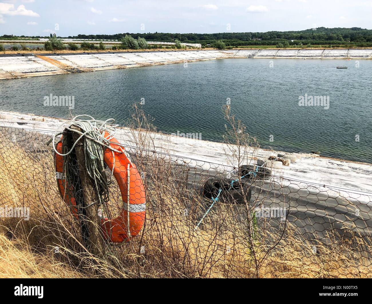 UK Weather: Water shortages in Godalming. Tuesley Lane, Godalming. 24th July 2018. Heatwave conditions in the south east today. Water levels at dangerously low levels in Godalming, Surrey. Credit: jamesjagger/StockimoNews/Alamy Live News Stock Photo