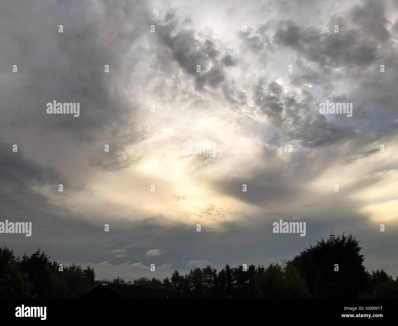 Bordon, UK. 27th July, 2018. UK Weather: Heavy rainfall in Churt. Cain Manor, Churt. 27th July 2018. Thundery showers moved across the south east this evening. Storm clouds over Churt in Hampshire. Credit: jamesjagger/StockimoNews/Alamy Live News Stock Photo