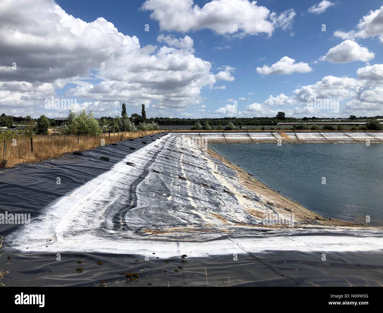 UK Weather: Water shortages in Godalming. Tuesley Farm, Godalming. 28th July 2018. Despite heavy rainfall overnight, water supplies remain critical. Water shortages, Tuesley Farm, Godalming. Credit: jamesjagger/StockimoNews/Alamy Live News Stock Photo