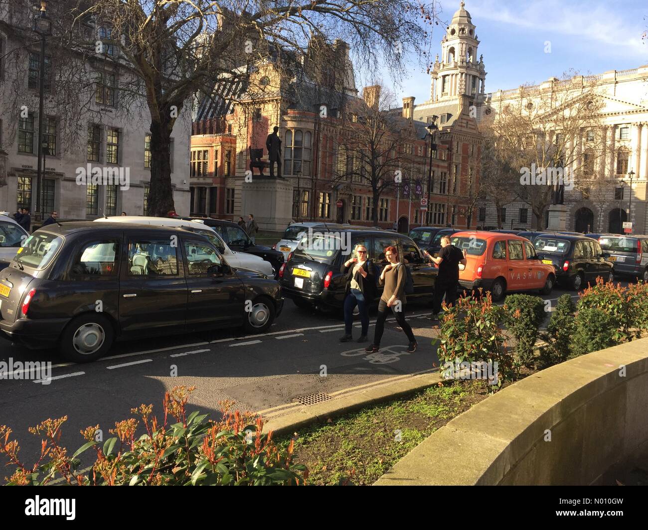 Parliament Square, London, UK. 22nd Feb 2019. Black cab drivers protest proposed changes to their licence Credit: Bridget1/StockimoNews/Alamy Live News Stock Photo