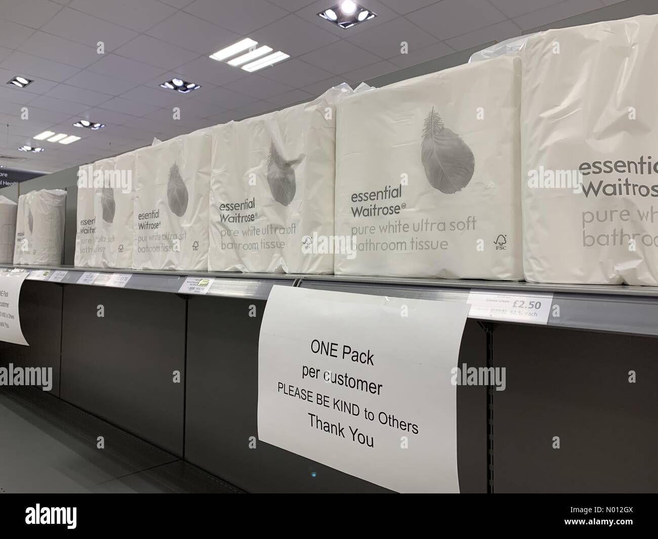 Uttoxeter, Staffordshire, UK. 18th Mar 2020. Toilet roll restocked in Waitrose supermarket, Uttoxeter, Staffordshire, rationed to one pack per customer, sold out within 20 minutes this morning Thursday, 18 March, amid UK Coronavirus panic buying Credit: Steve Baker/StockimoNews/Alamy Live News Stock Photo