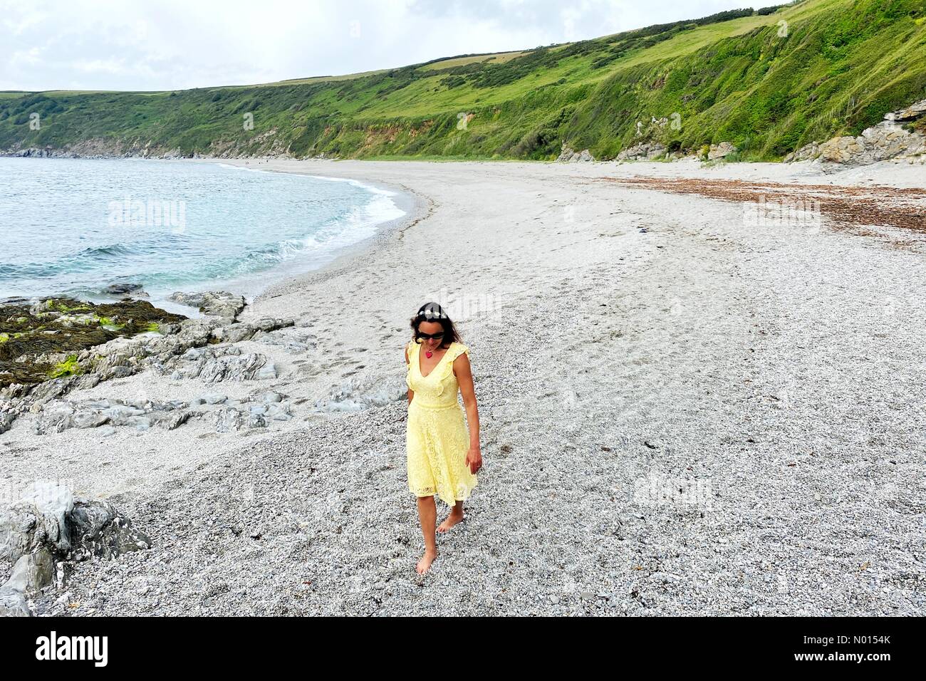 Vault beach, Cornwall, UK. 20th June, 2021. Raich Keene enjoys the