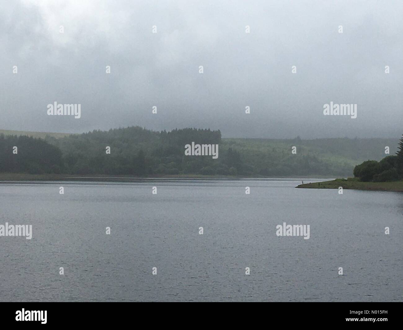 Llwyn Onn reservoir, Merthyr Tydfil, South Wales, UK. 15 August 2021. UK weather: Rain showers and occasional sunny spells this afternoon. Credit: Andrew Bartlett/StockimoNews/Alamy Live News Stock Photo