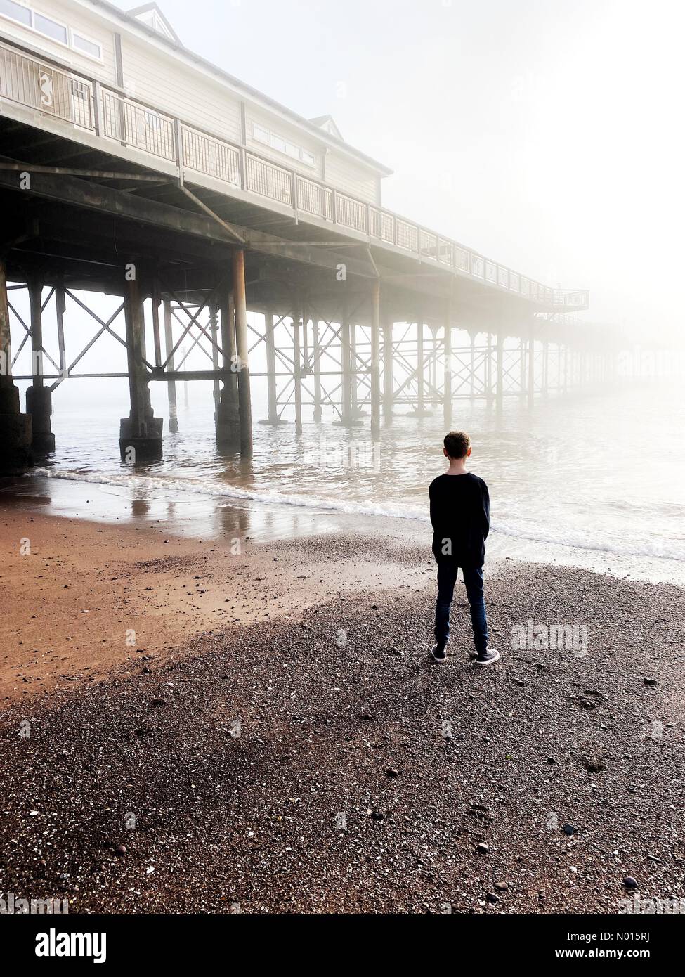 Teignmouth, Devon, UK. 17th Oct 2021.  UK Weather: Mild misty mood at Teignmouth pier, Devon, UK. 17th October, 2021. Credit nidpor/ Alamy Live News Credit: nidpor/StockimoNews/Alamy Live News Stock Photo