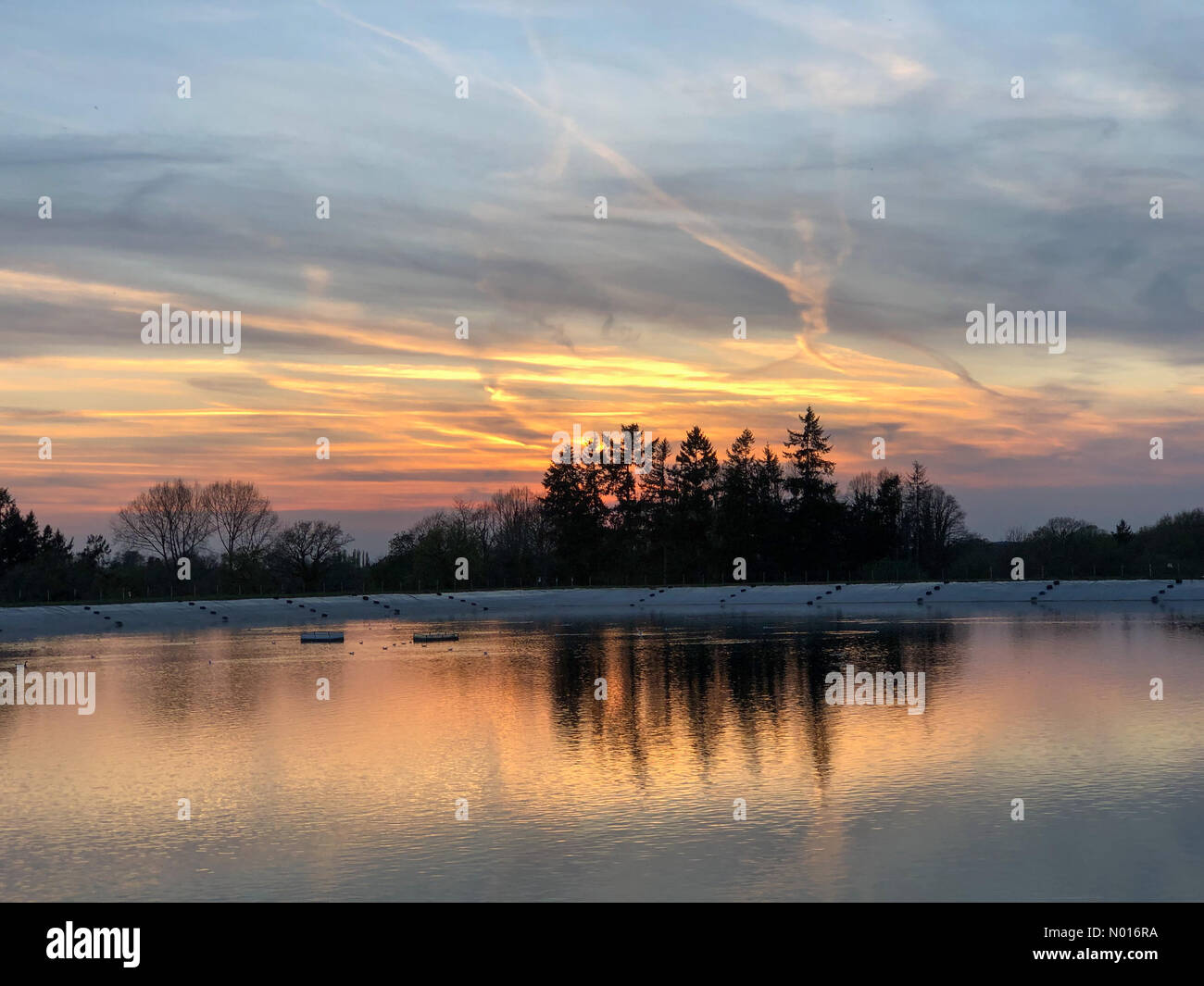 Godalming, Surrey. 16th Apr 2022. UK Weather Sunset over Godalming
