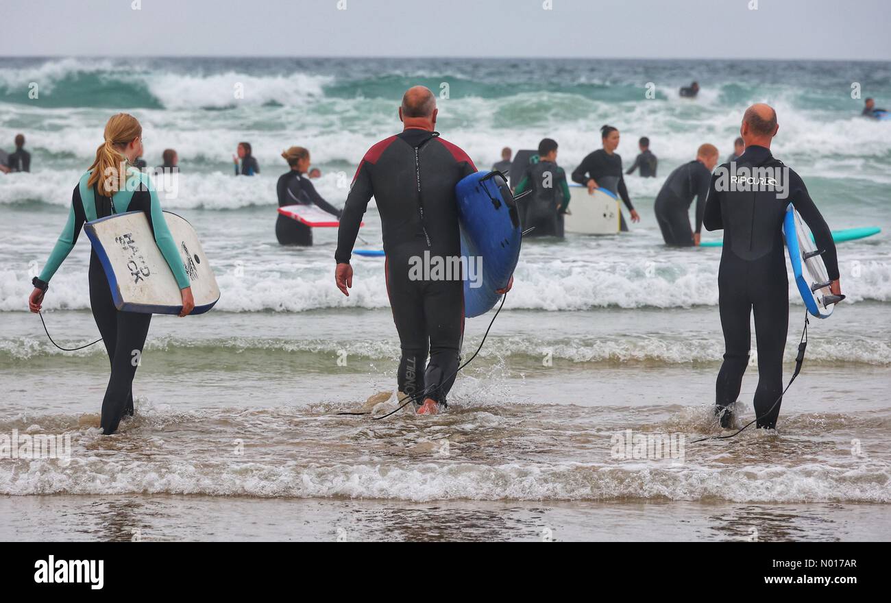 Cornwall, UK. 23rd July, 2022. UK Weather: Overcast for surfers at Polzeath, Cornwall, UK. 23 July 2022. Credit: nidpor / StockimoNews/17�Թ����� Live News Stock Photo