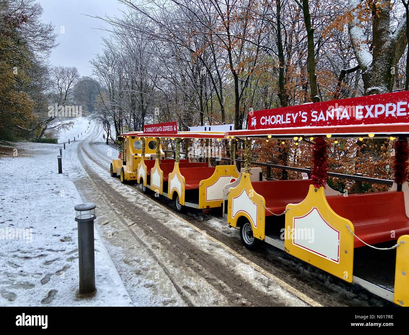 UK Weather Snow in Chorley, Lancashire. Santa express road train at