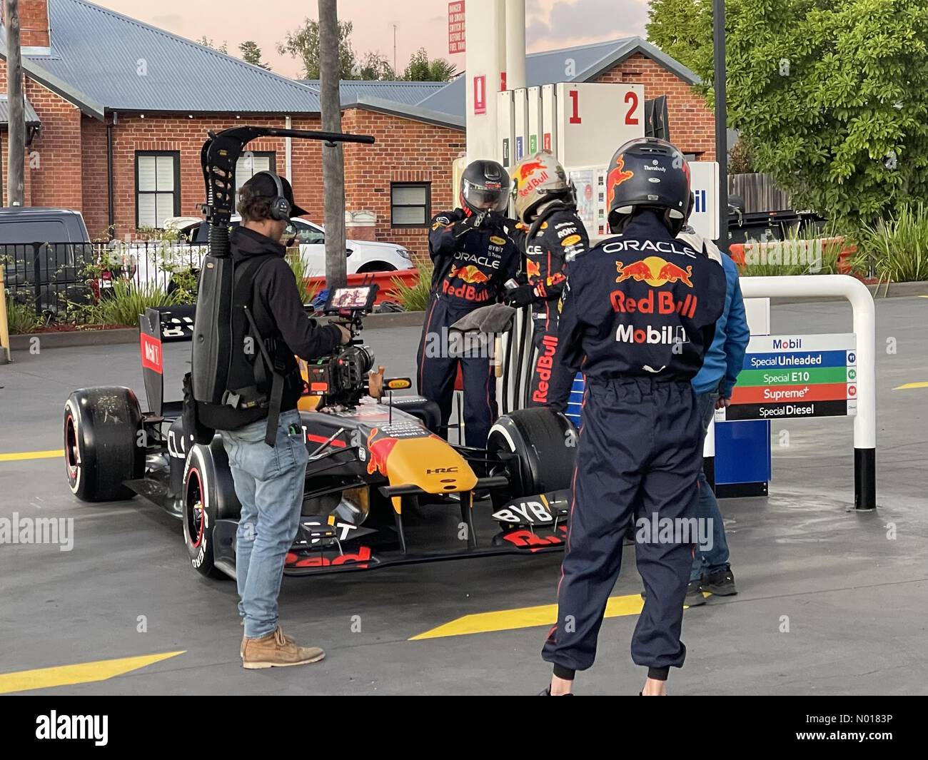 F1 driver Liam Lawson seen filming a Red Bull commercial at a 7 Eleven service station in Bathurst, NSW, Australia Credit: mjmediabox/StockimoNews/Alamy Live News Stock Photo