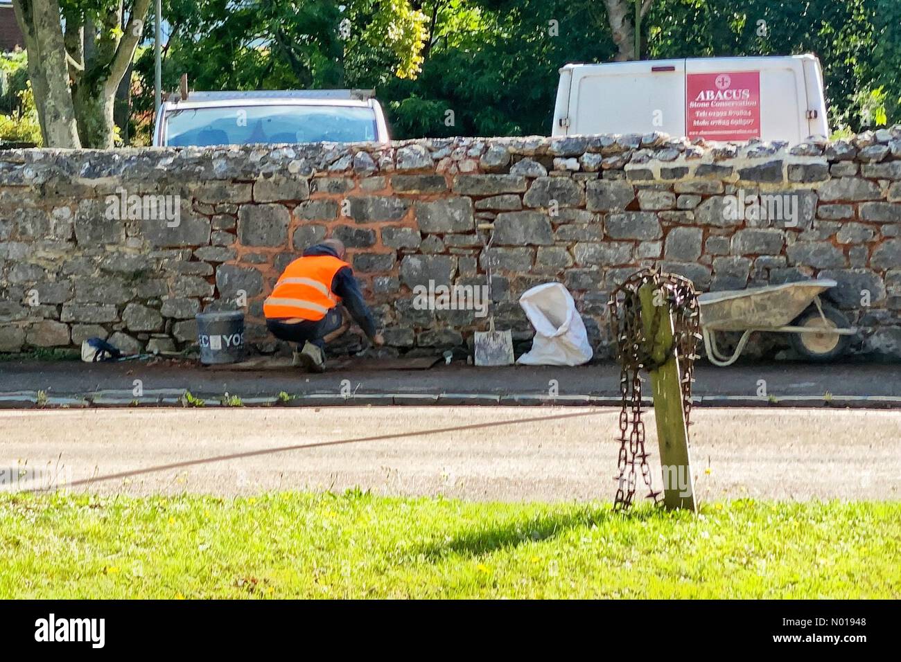 Scene after heavy floods in Kenton, near Exeter, Devon, UK. Wall