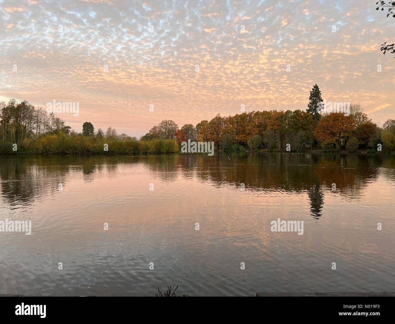 UK Weather Sunrise over Godalming. Broadwater Lake, Godalming. 23rd