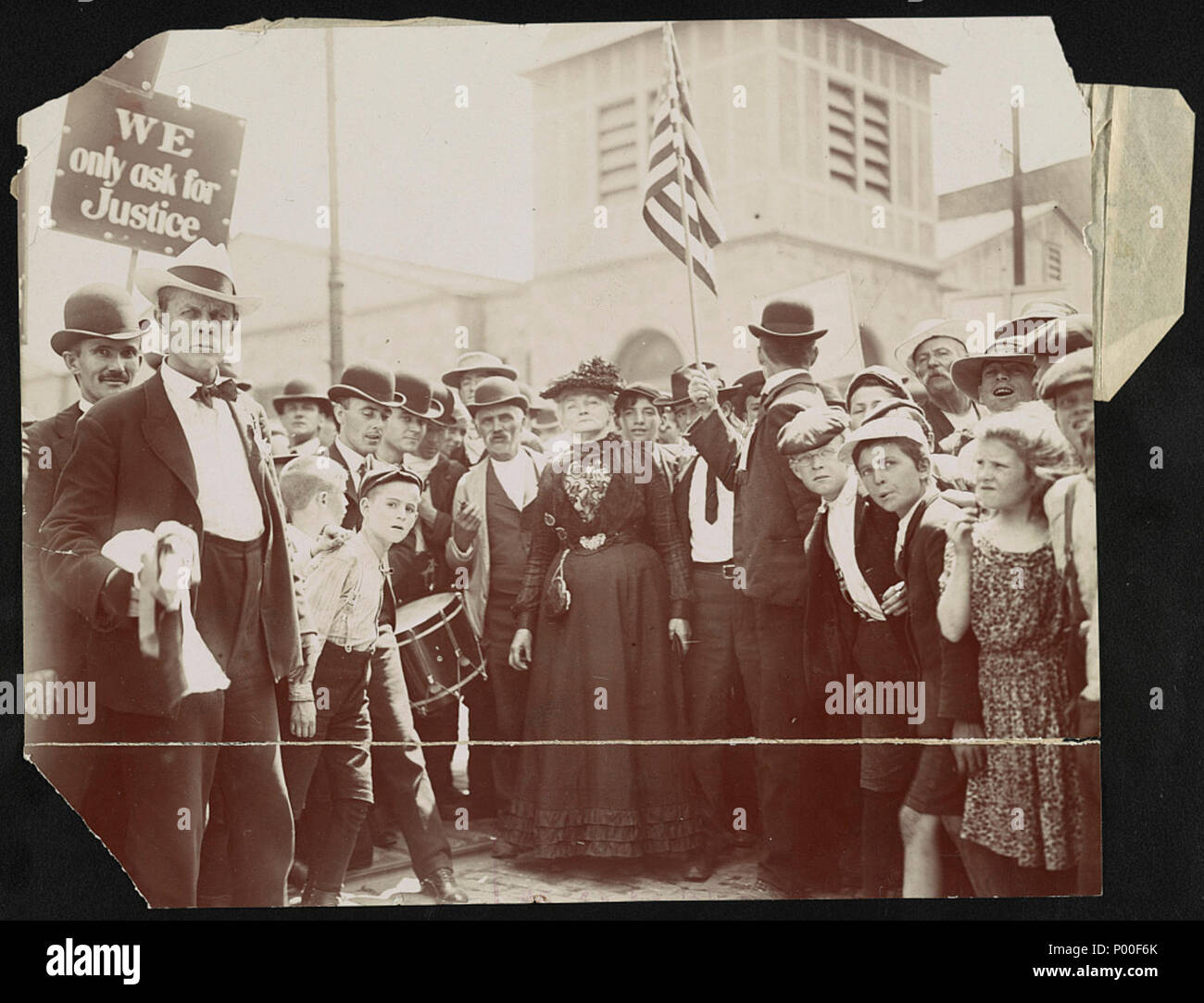 Mother Jones and her army of striking textile workers starting out for