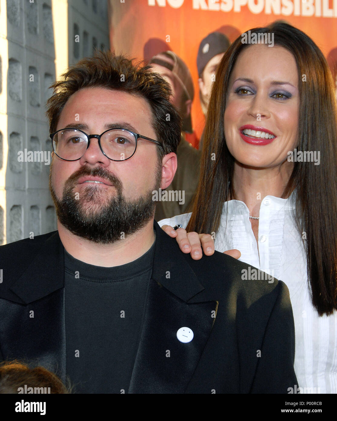 Kevin Smith and Jennifer Schwalbach-Smith arriving at the CLERK 2 Premiere at the Arclight Theatre  In Los Angeles. July 11,  2006. husband and wifeSmithK SchwalbachSmithJ41  Event in Hollywood Life - California, Red Carpet Event, USA, Film Industry, Celebrities, Photography, Bestof, Arts Culture and Entertainment, Celebrities fashion, Best of, Hollywood Life, Event in Hollywood Life - California, Red Carpet and backstage, Music celebrities, Topix, Couple, family ( husband and wife ) and kids- Children, brothers and sisters inquiry tsuni@Gamma-USA.com, Credit Tsuni / USA, 2006 to 2009 Stock Photo